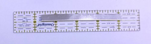 Judy Larson's Make a Hidden Bail - , Metalwork, Butane Torch, Soldering, Solder, Flatten the strip on a bench block 